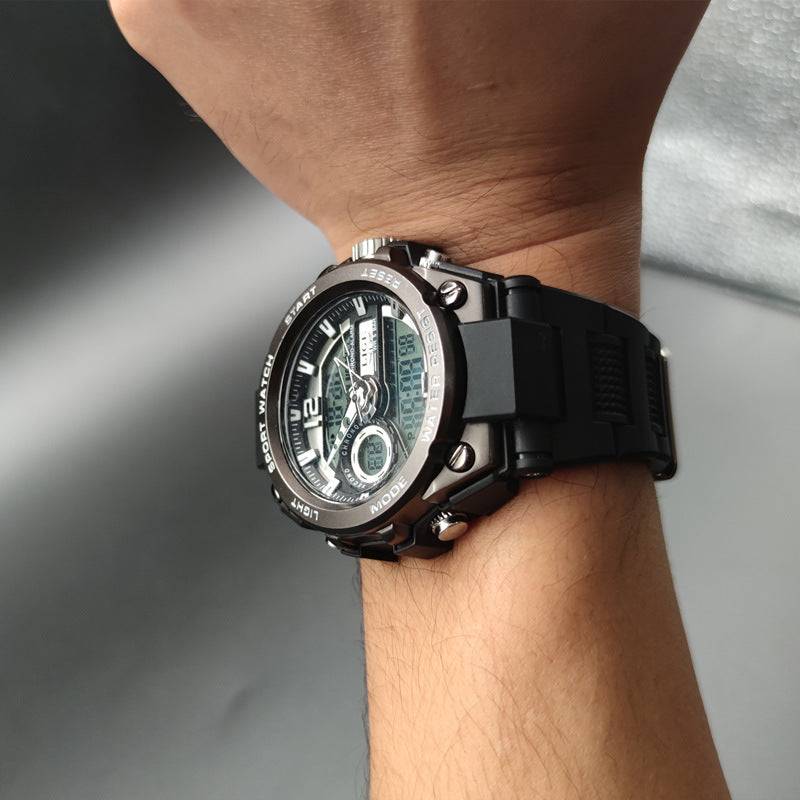 Dual Display Advanced Quartz Fashion Electronic Sports Watch in all-black with digital and analog display, worn on wrist for active lifestyle appeal.